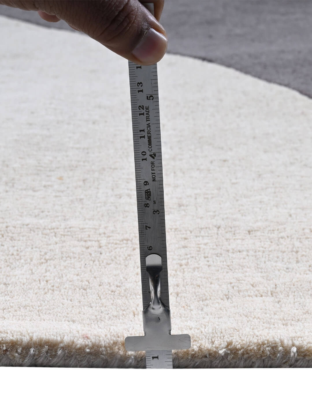 measuring pile height of tufted rug