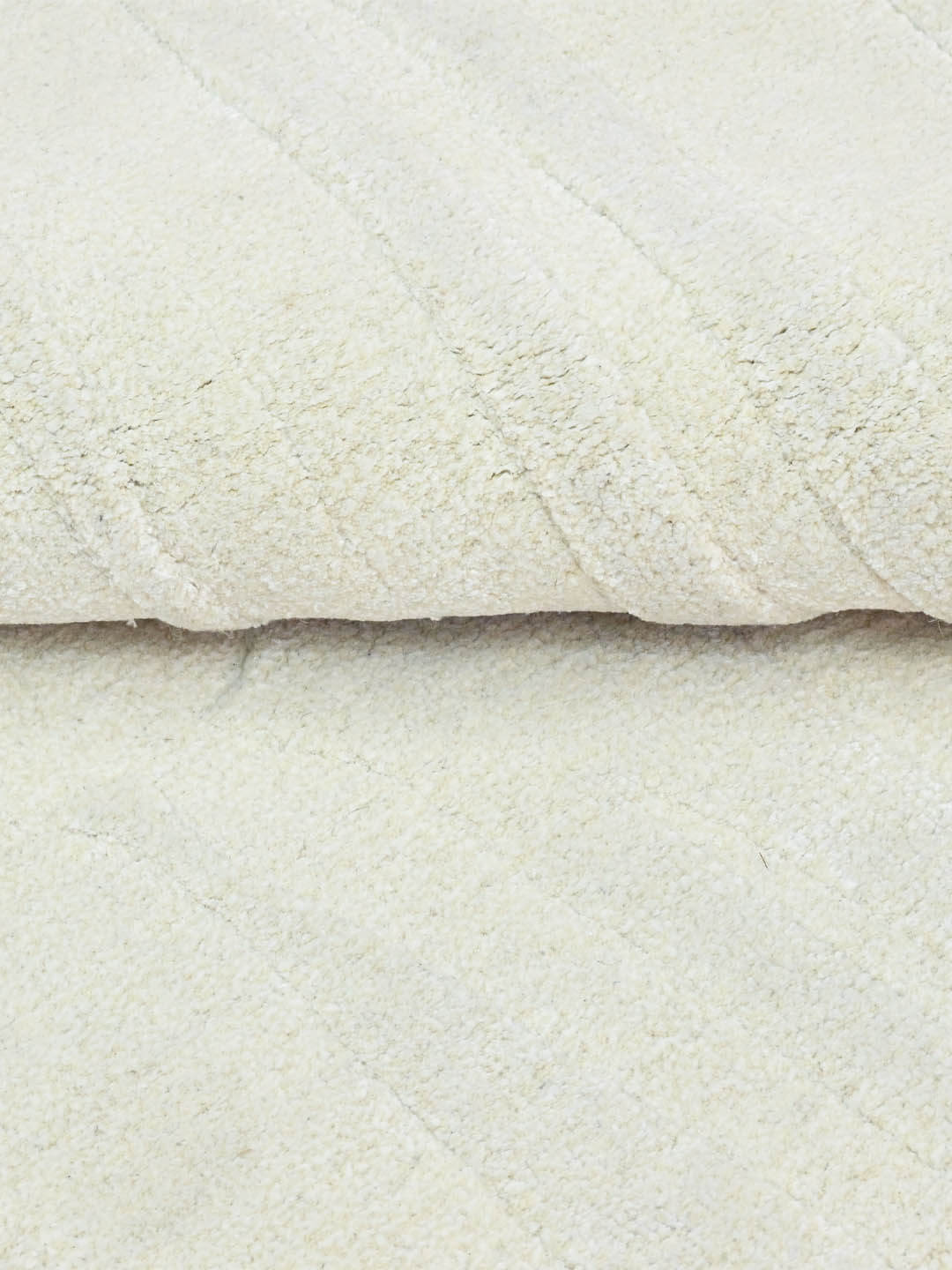 white wool rug close up