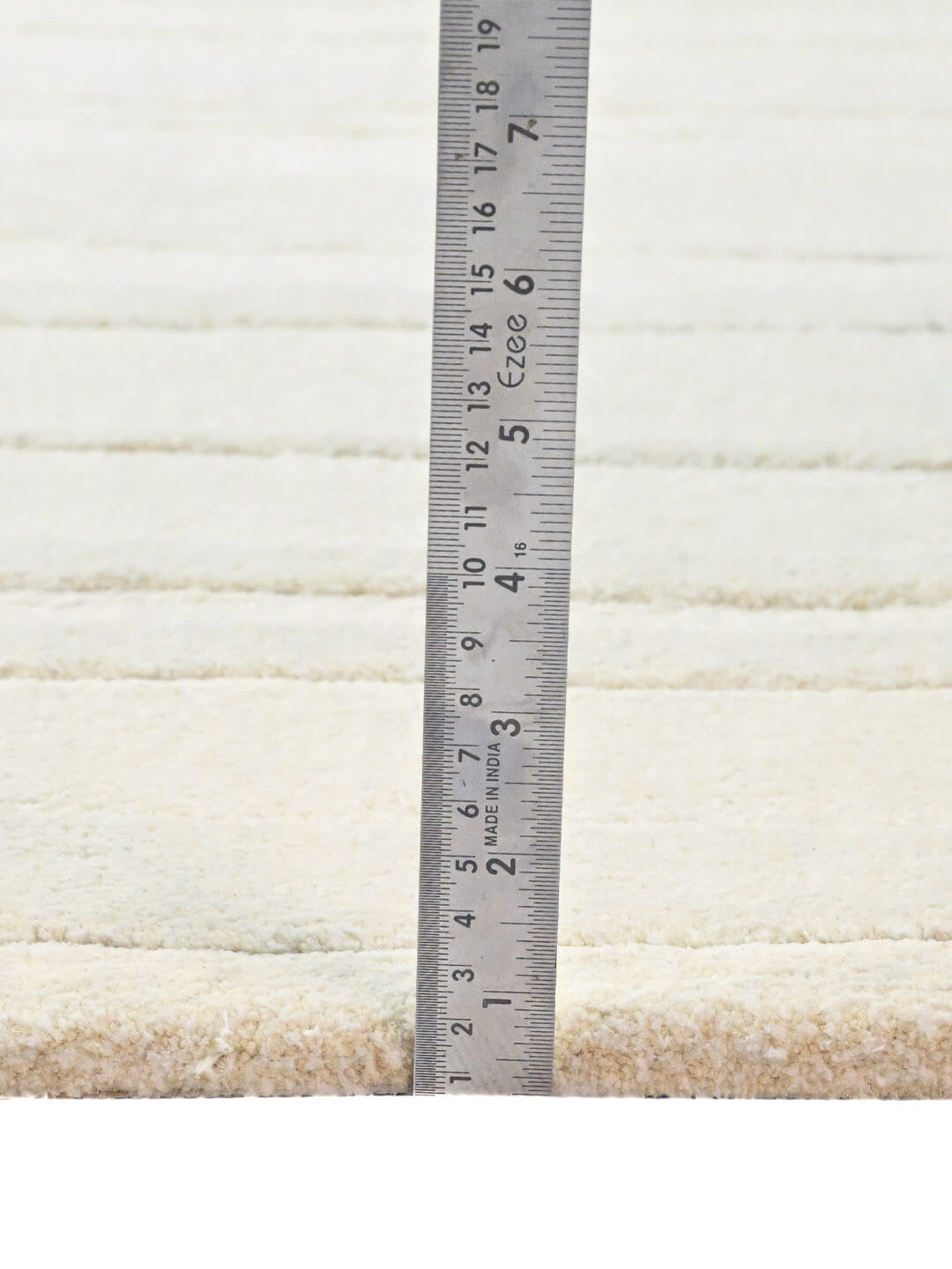 measuring tufted wool rug pile