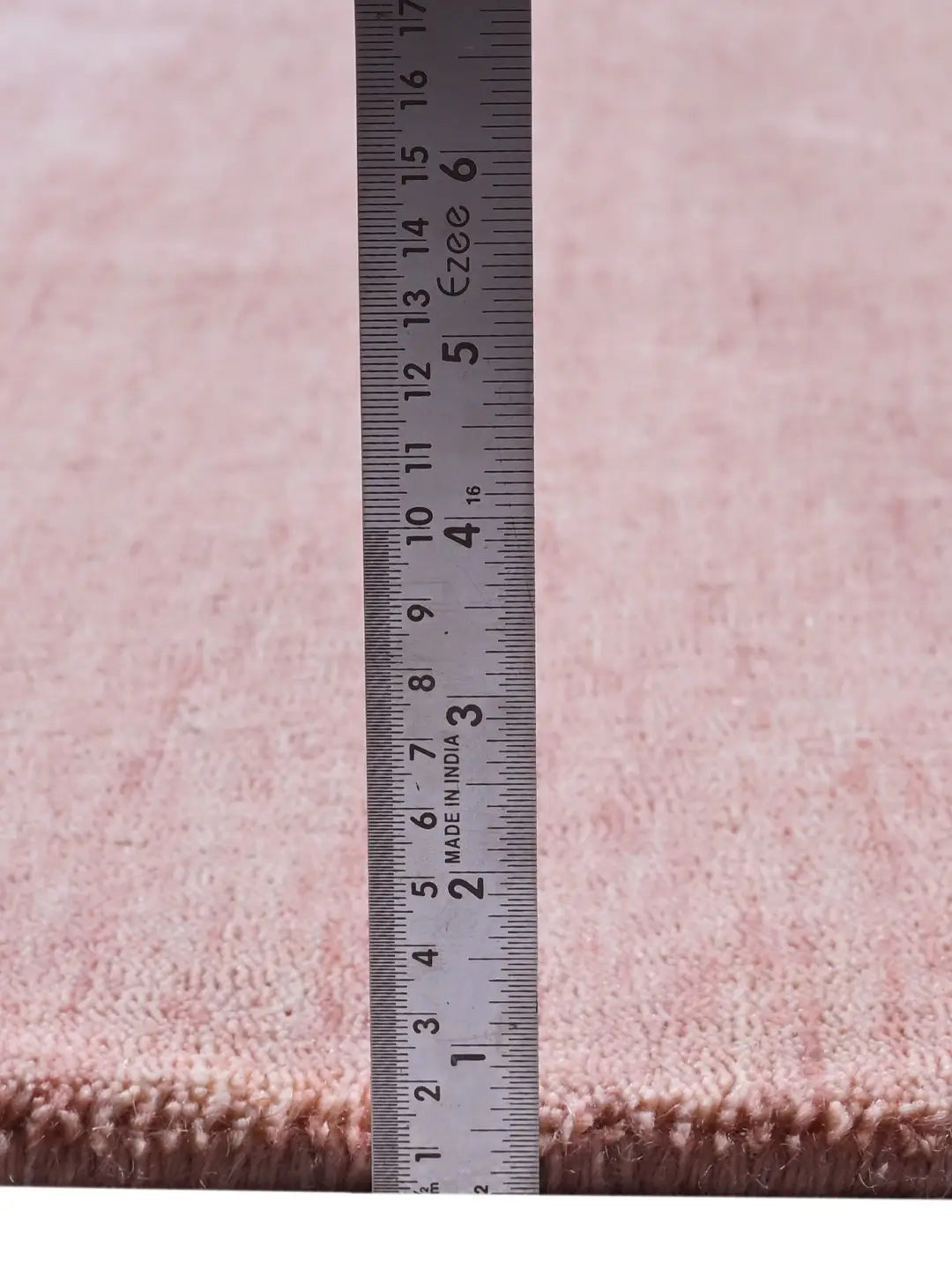pile height of a handloom rug