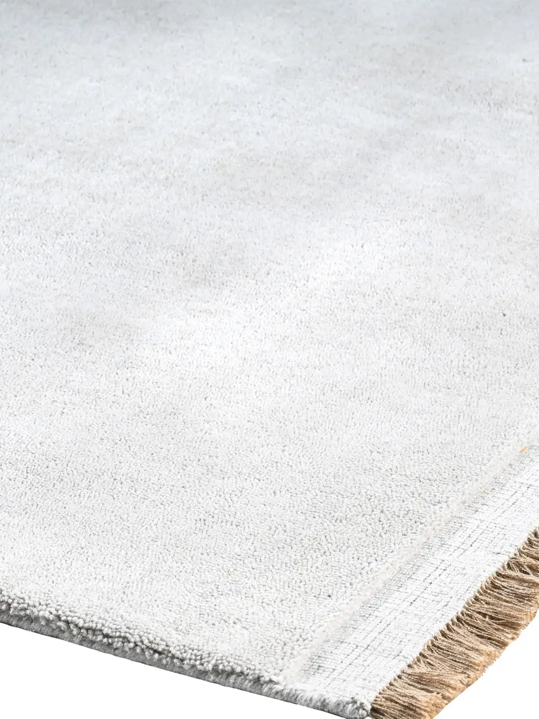 white wool rug corner