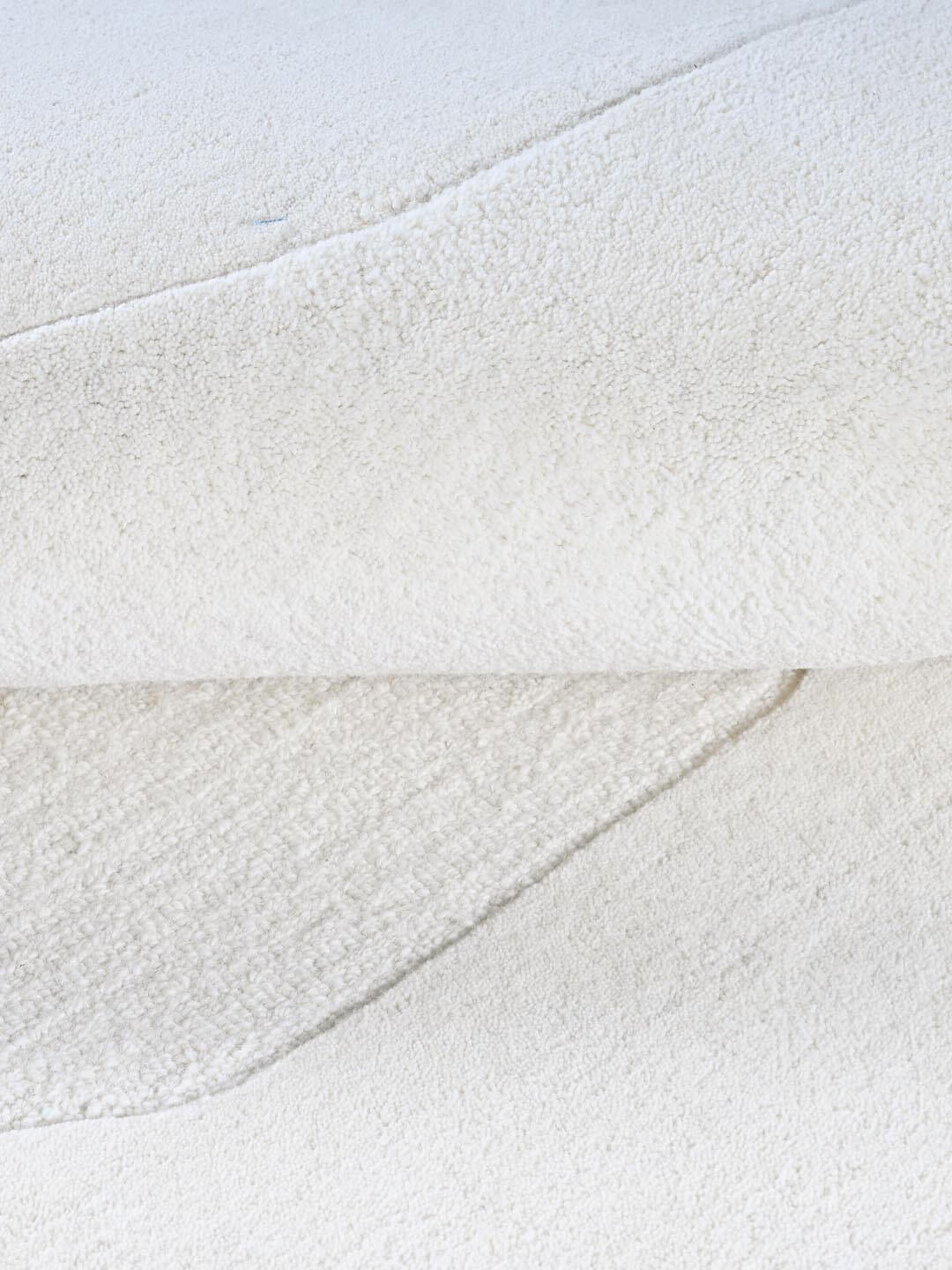 white wool rug close up