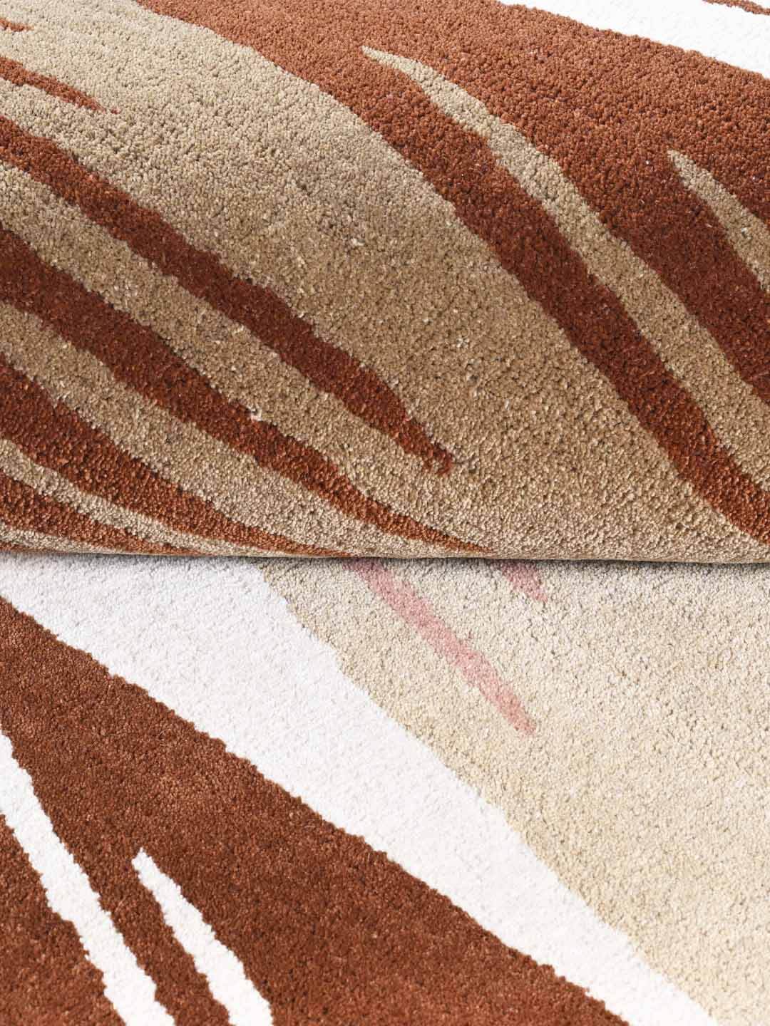 Close-up of a brown and beige patterned rug