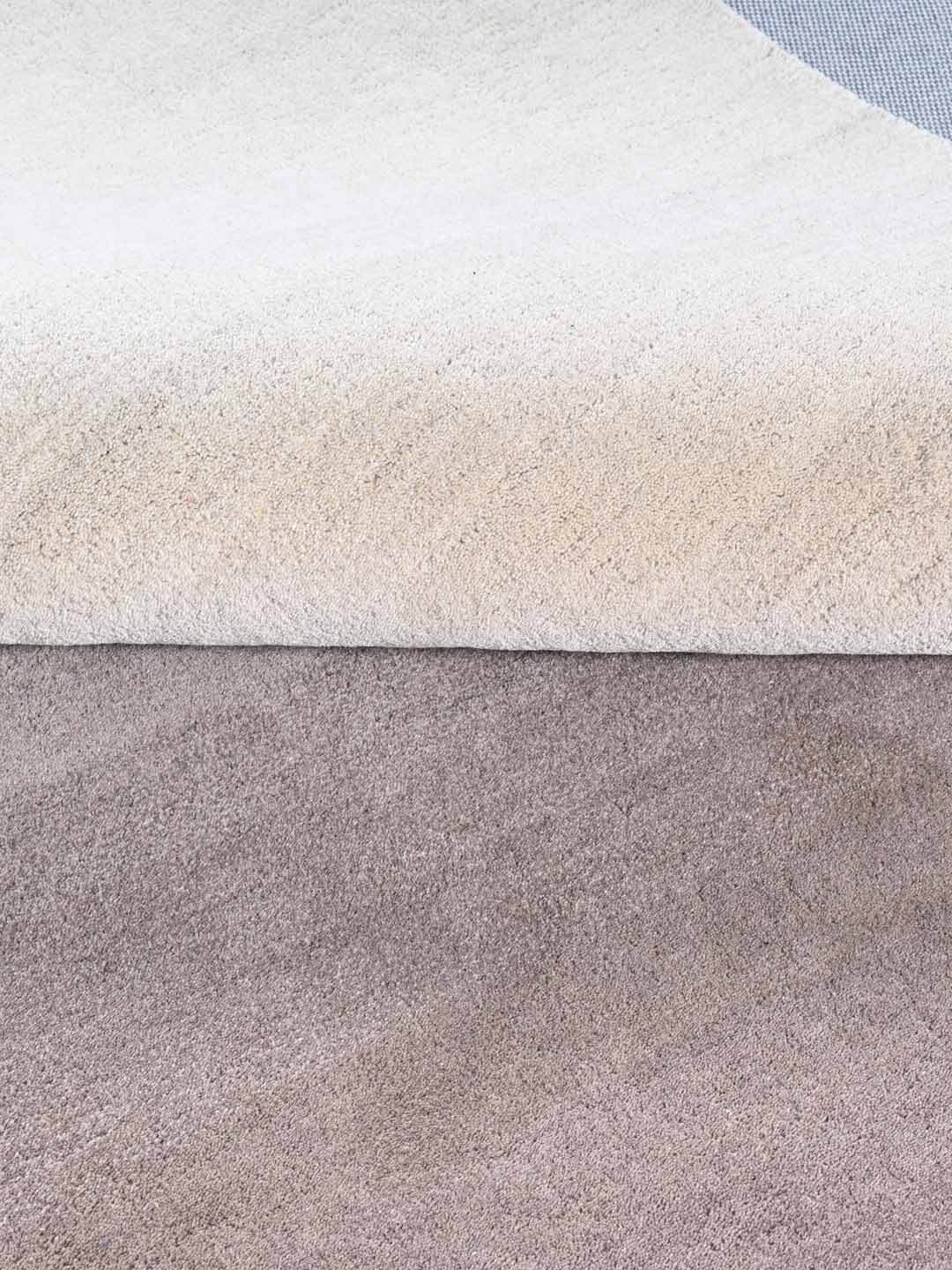 grey tufted wool rug by bhadohirug