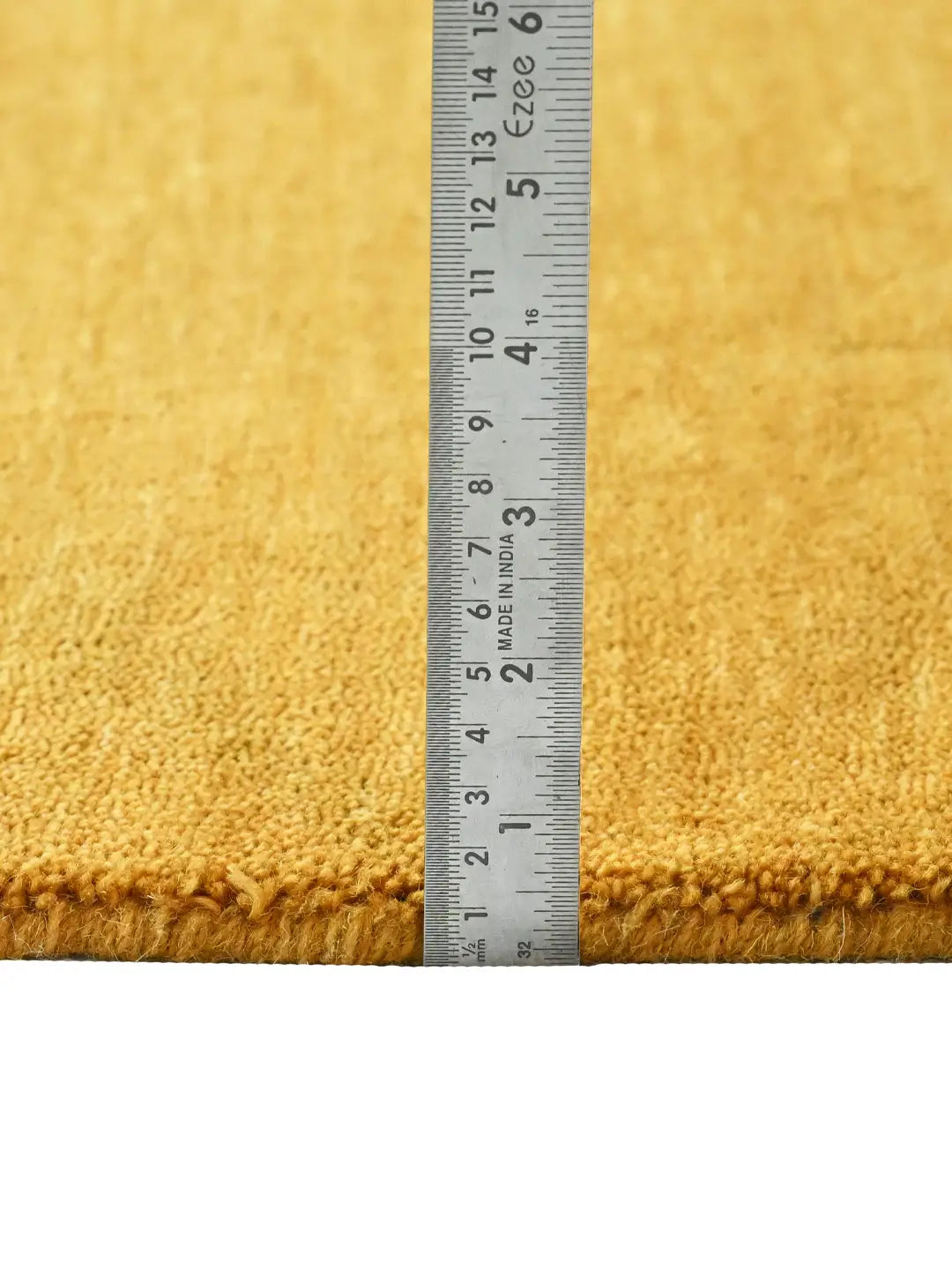 pile height of a handloom carpet