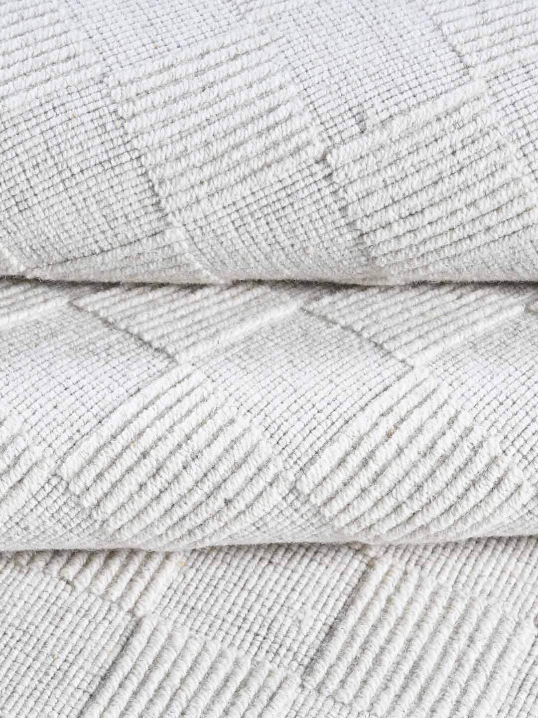 white handloom rug